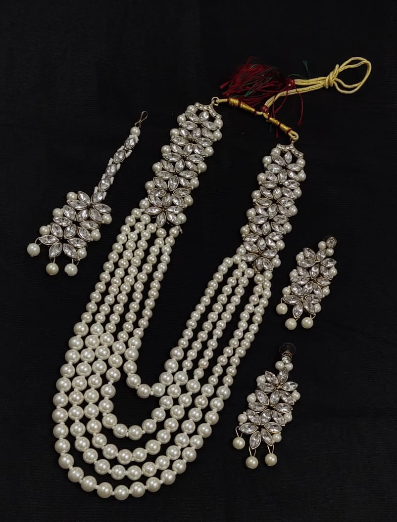 White pearl hot sale kundan set