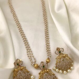 Elegant Pearl Beaded Guttapusalu Necklace Set with Gold-Toned & Stone-Studded Pendant