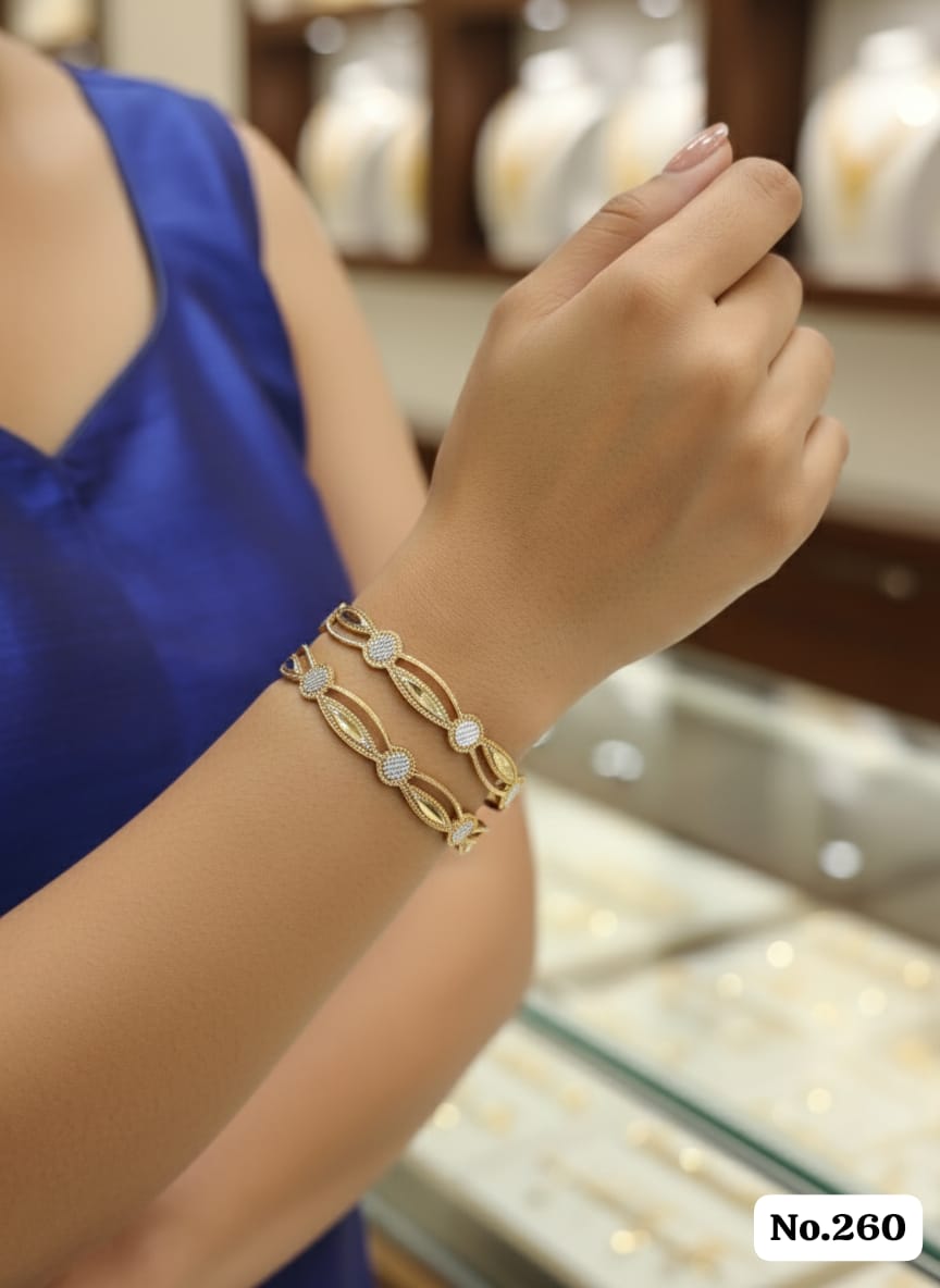 Delicate Gold-Tone Bangles with Sparkling Diamond-Shape Studs (Set of 2)