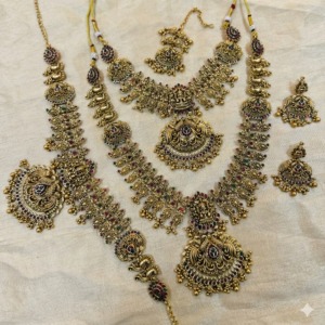 Matte Finish Temple Jewelry with Long Haram, Choker, Earrings, Maang Tikka & Hip Belt | Wedding & Festive Wear (Antique Gold)