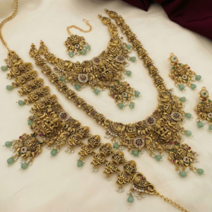 Semi-Bridal Long & Short Necklace, Earrings, Maang Tikka, and Waist Belt (Vaddanam) | Antique Gold Plated with Mint Green Beads for Women (Green)