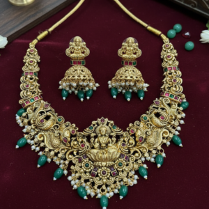 Antique Matte Finish Nakshi Short Necklace with Jhumka Earrings | Ethnic Bridal & Festive Wear for Women and Girls (Green & Ruby Stone Accents)