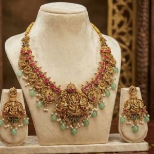 Antique Ganesha Pendant Short Necklace with Matching Drop Earrings | Handcrafted Nakshi Work with Kemp Stones and Mint Green Beads