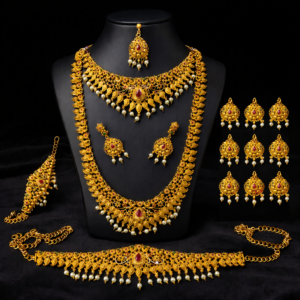 Grand Temple Bridal Jewellery with Long Haram, Choker, Oddiyanam (Waist Belt), Vanki, Maang Tikka, and Jhumka Earrings | Ruby Red Kemp Stones & Pearl Droplets
