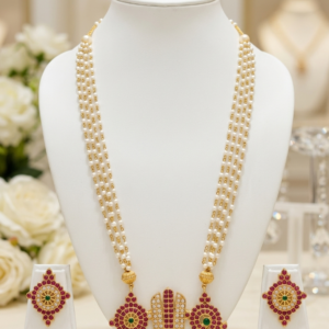 Traditional Shankh Chakra Tilak Pendant Pearl Long Necklace Set with Gold Polish & Stud Earrings for Women