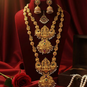 Antique Gold-Plated Matte Temple Jewelry Combo Set with Lakshmi & Peacock Motifs (Short Necklace, Long Haram, Jhumkas & Maang Tikka)