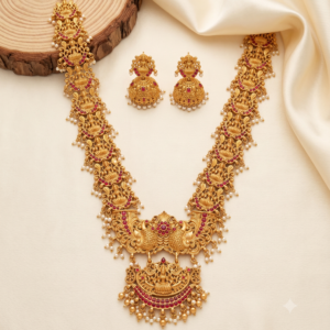 Ruby Lakshmi Motif Long Haram with Twin Peacock Pendant & Jhumka Earrings