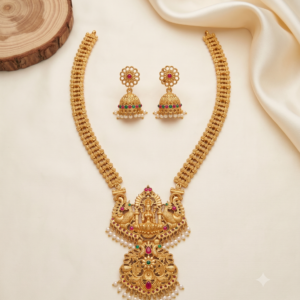 Lakshmi Twin Peacock Two-Tier Long Haram with Pearl Jhumka Earrings