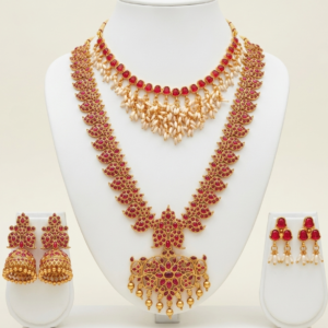 Gold plated bridal jewellery set with long haar, choker and earrings in ruby red