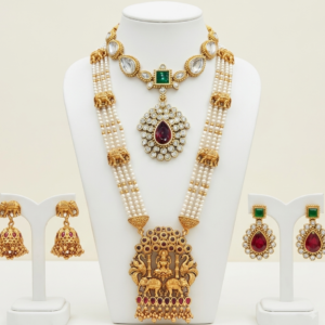 Traditional gold plated pearl long haar temple jewellery set with elephant pendant and earrings