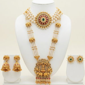 Traditional gold plated pearl long haar temple jewellery set with elephant pendant and choker