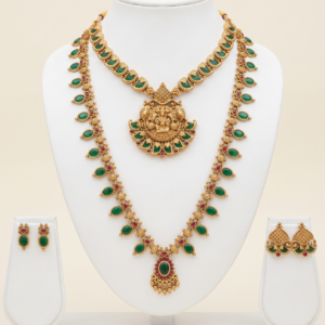 South Indian green long haram and Lakshmi pendant necklace set with earrings in matte gold finish