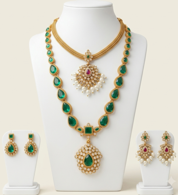 South Indian green stone long and short necklace set with matte gold finish, pearl drops and two pairs of earrings
