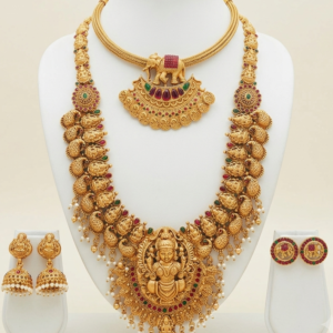 South Indian matte gold finish Lakshmi long haram with elephant pendant short necklace and two pairs of matching earrings