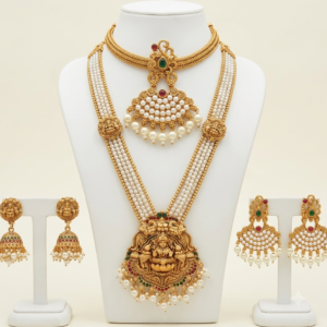 South Indian matte gold Lakshmi pearl long haram and pearl choker necklace combo with two pairs of earrings
