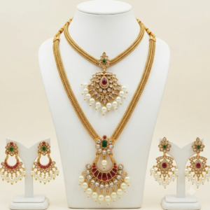 Traditional antique gold long haram and short pendant necklace combo with two pairs of pearl drop earrings