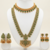 Traditional gold plated long haar and choker jewellery set with earrings in emerald green