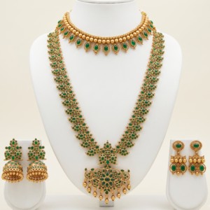 Traditional gold plated long haar and choker jewellery set with earrings in emerald green
