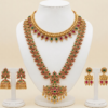 Traditional gold plated long haar and choker jewellery set with earrings in red and green multicolor