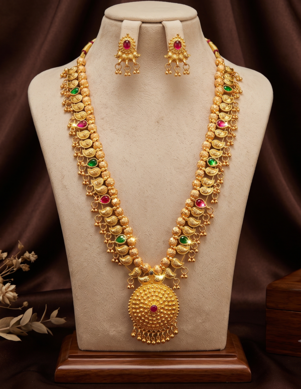 Maharashtrian gold plated long Kolhapuri Saaj necklace with ruby green stone accents and matching earrings