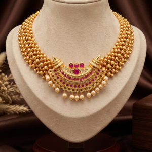Maharashtrian gold plated Thushi necklace with half moon pendant, ruby-colour stones and pearl-style beads