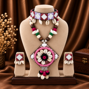 Navratri mirror work cowrie shell statement necklace set with matching earrings