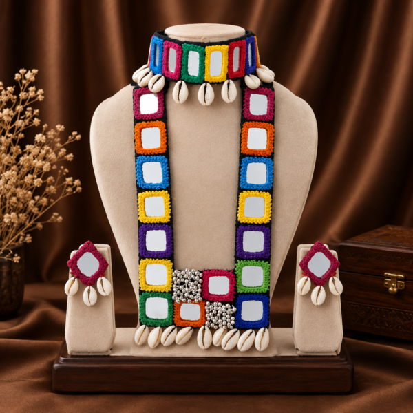 Navratri multicolour mirror work long necklace set with cowrie shells and earrings