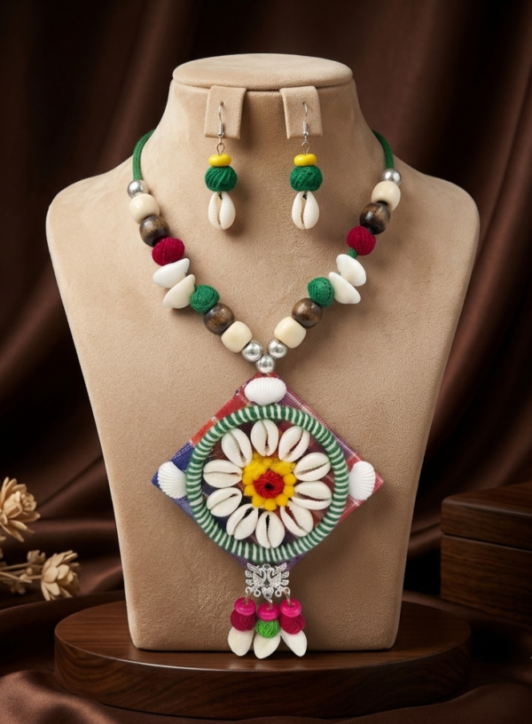 Navratri cowrie shell diamond pendant thread necklace set with matching earrings
