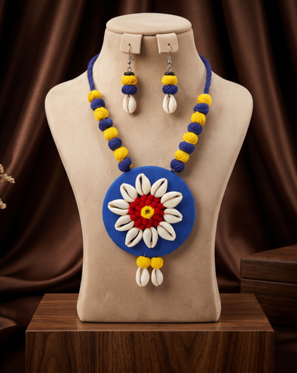 Navratri blue and yellow cowrie shell thread statement necklace set with earrings