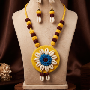 Navratri yellow and maroon cowrie shell thread statement necklace set with earrings