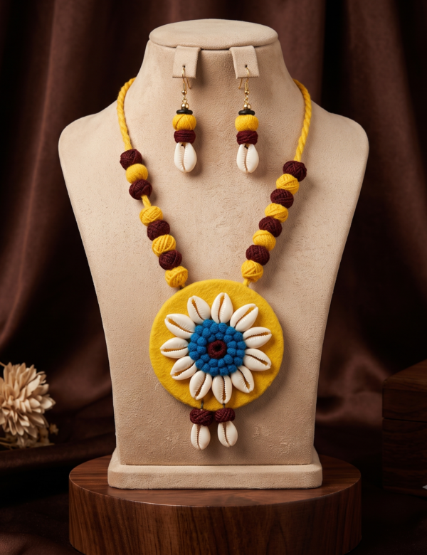Navratri yellow and maroon cowrie shell thread statement necklace set with earrings