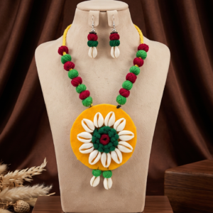 Navratri yellow green and maroon cowrie shell thread necklace set with earrings