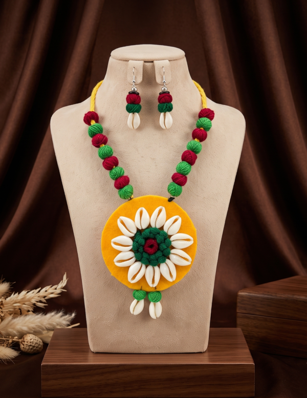 Navratri yellow green and maroon cowrie shell thread necklace set with earrings