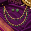 Emerald green double layer oval stone necklace set with matching floral earrings