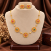 Ruby emerald floral motif traditional necklace set with matching earrings