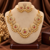 Peacock kundan stone necklace set with ruby emerald accents and earrings