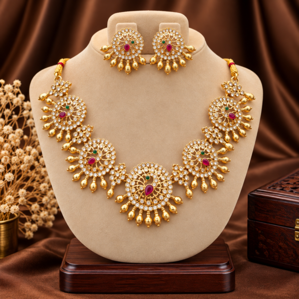 Peacock kundan stone necklace set with ruby emerald accents and earrings