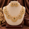 Traditional peacock stone necklace with white stones and gold bead drops