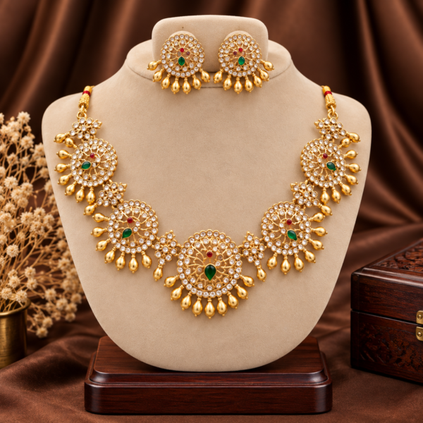 Traditional peacock stone necklace with white stones and gold bead drops