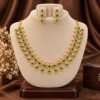 Emerald green teardrop stone traditional necklace set with matching earrings