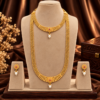 Woman wearing golden beads short necklace and long haram combo set