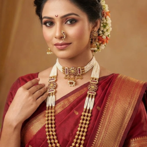 Maharashtrian semi bridal pearl and gold finish jewellery set with choker, 3-strand bormala haram, jhumkas, and nath on Marathi bride in Nauvari saree