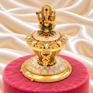 Lord Ganesha kumkum box with pink floral design and decorative stones