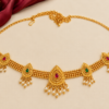 Traditional gold finish paisley Kamarpatta waist belt with five mango-shaped ornaments, ruby green stones and pearl-style hanging drops.